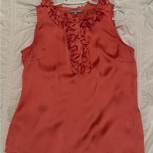 Excellent used summer sleeveless top in like a burnt orange to a coral color.